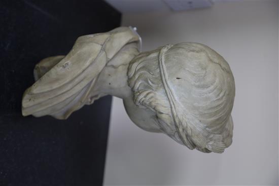 After the antique. An early 19th century marble bust of an Imperial Roman youth H. 13in.